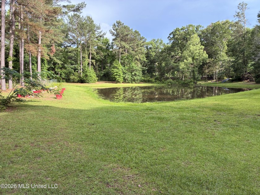 Nestled among towering pines with peaceful pond views, this - photo 41