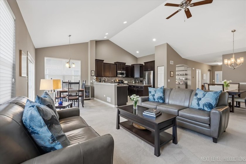 Enjoy carefree, low-maintenance living in this meticulously - photo 4