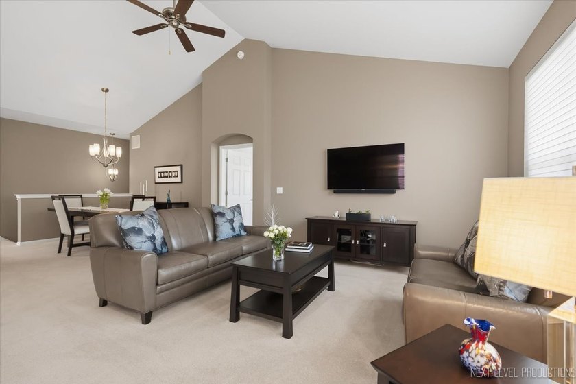 Enjoy carefree, low-maintenance living in this meticulously - photo 5