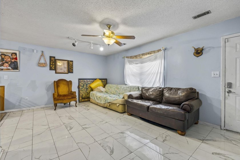 Tucked away in the highly desirable Rosewood community, this - photo 3