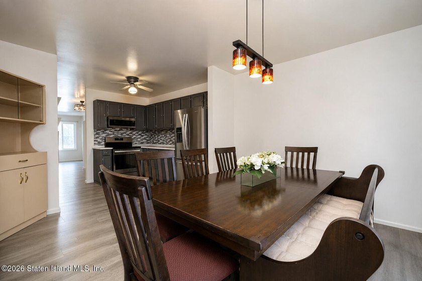 Welcome to this beautifully maintained, mint-condition attached - photo 6