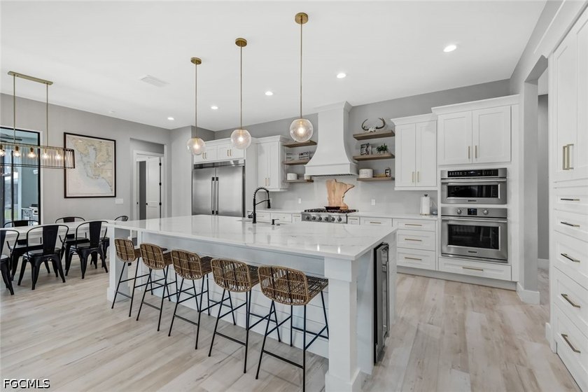 This custom-built Gulf access home offers 2,721 square feet of - photo 11