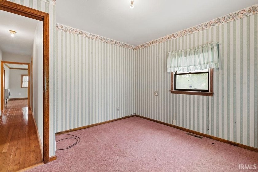 Situated on 1.28 acres in a country setting, this 3-bedroom - photo 15