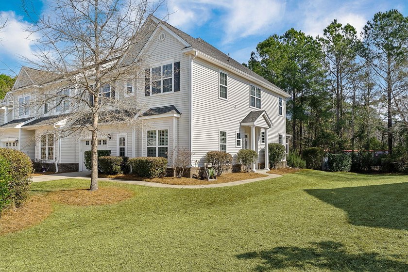 Stunning and spacious, this expansive end-unit residence offers - photo 2