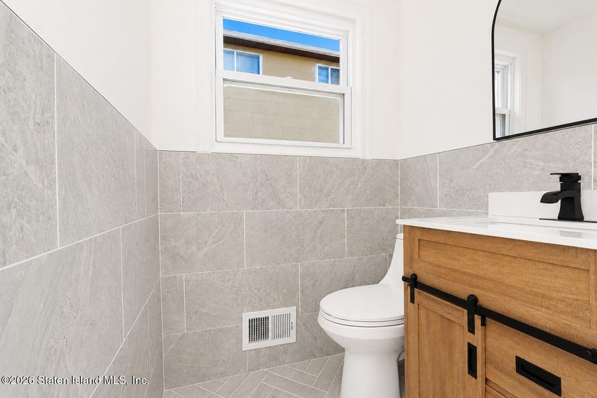 Welcome to 216 Woodrow Road, a beautifully renovated - photo 5