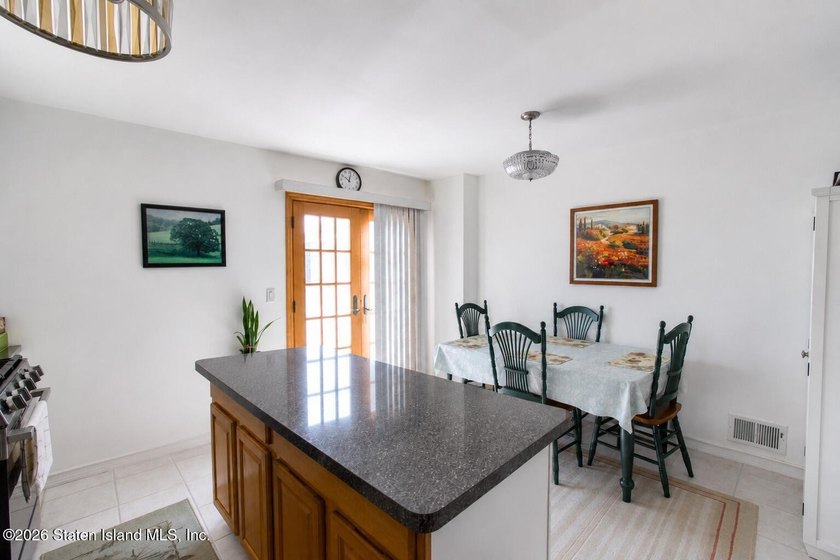 Welcome to 75 Gower Street, Staten Island! This well-maintained - photo 9