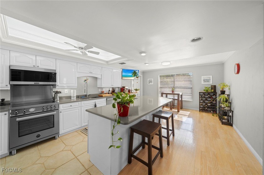 Enjoy panoramic riverfront living with sweeping views of the - photo 8