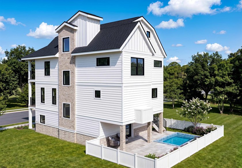 BEST DEAL ON THE ISLAND! Discover elevated coastal living in - photo 2