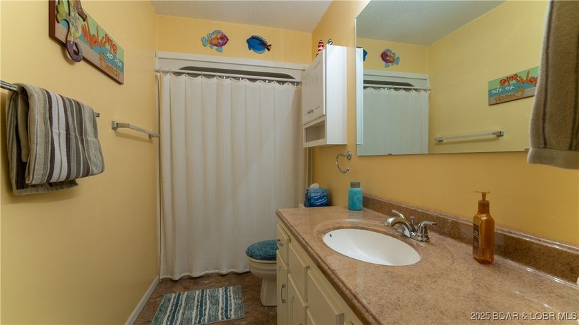 Turnkey lakefront living with strong rental appeal in the heart - photo 16