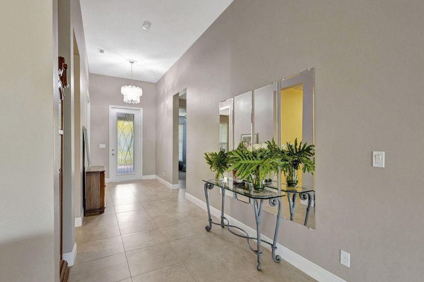 This beautiful home features four bedrooms, three bathrooms, and - photo 7