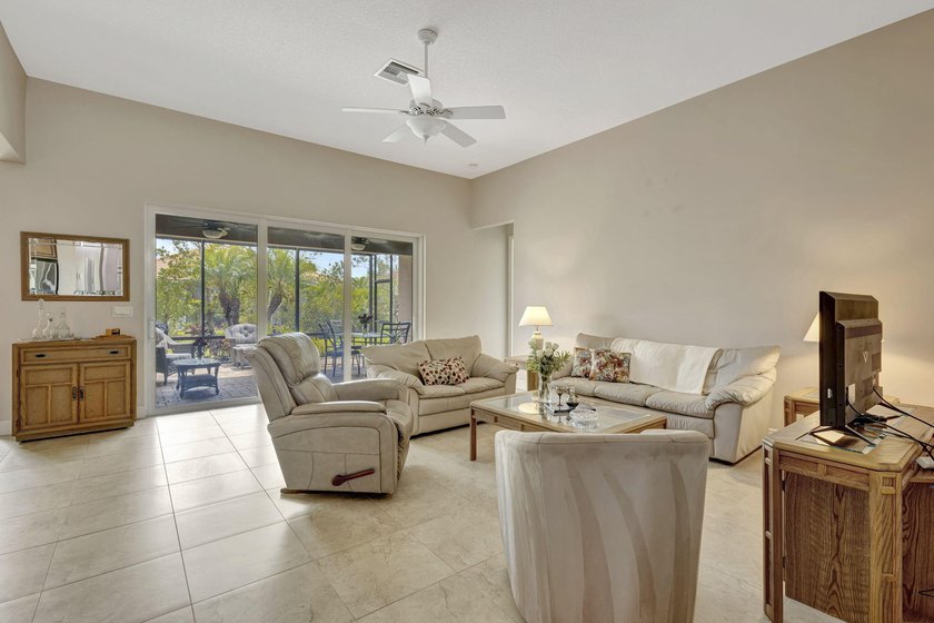 This beautiful home features four bedrooms, three bathrooms, and - photo 8