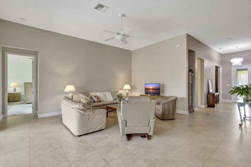 This beautiful home features four bedrooms, three bathrooms, and - photo 9