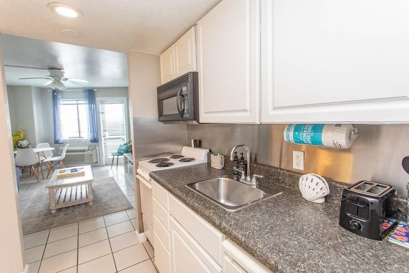 This one-bedroom condo comes fully furnished. It is perfect as a - photo 8