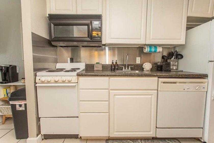 This one-bedroom condo comes fully furnished. It is perfect as a - photo 9