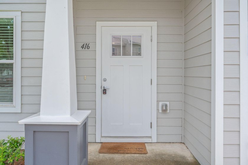 Welcome to 416 Date Palm Lane, a beautifully maintained end-unit - photo 4