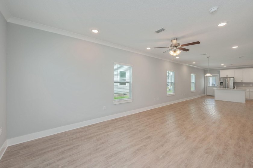 Welcome to 416 Date Palm Lane, a beautifully maintained end-unit - photo 6