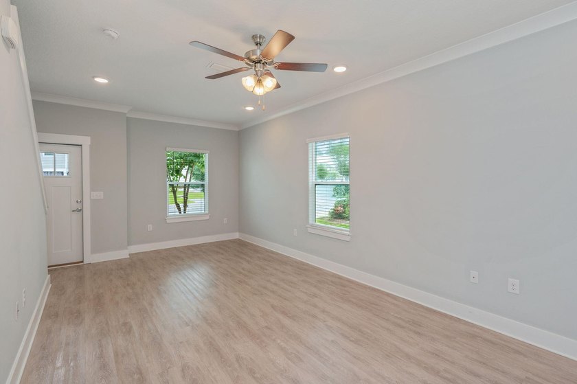 Welcome to 416 Date Palm Lane, a beautifully maintained end-unit - photo 9