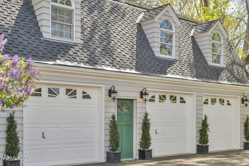Behind a private tree lined drive in Holcomb Ranch lies a rare - photo 6