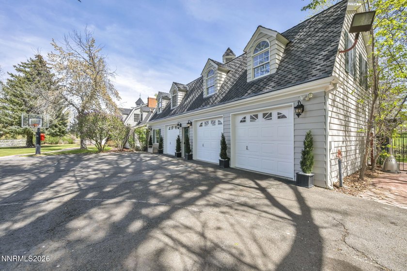 Behind a private tree lined drive in Holcomb Ranch lies a rare - photo 8
