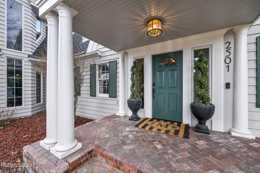 Behind a private tree lined drive in Holcomb Ranch lies a rare - photo 10