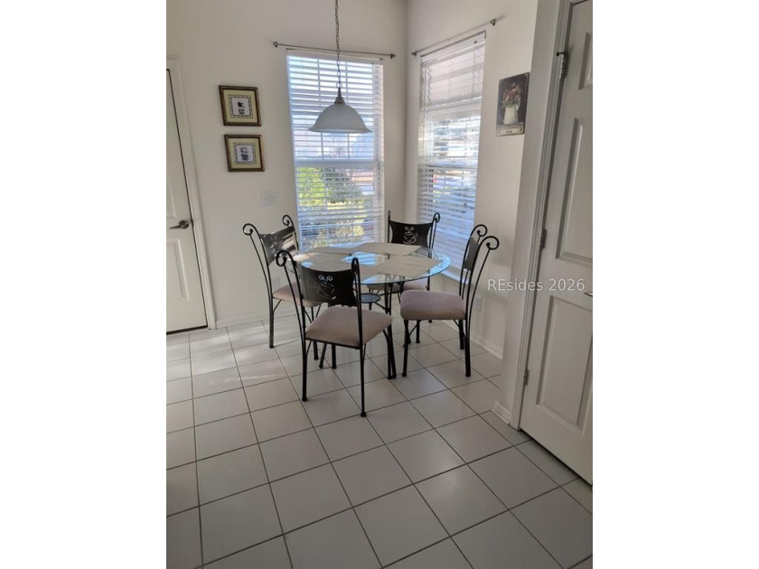 Furnished and move-in ready, this well-maintained 3-bedroom - photo 4
