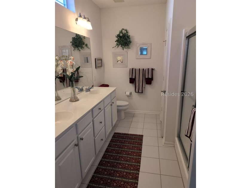 Furnished and move-in ready, this well-maintained 3-bedroom - photo 5