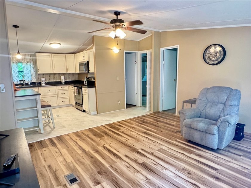 This 3-bedroom, 2-bathroom home is located on an interior lot in - photo 4