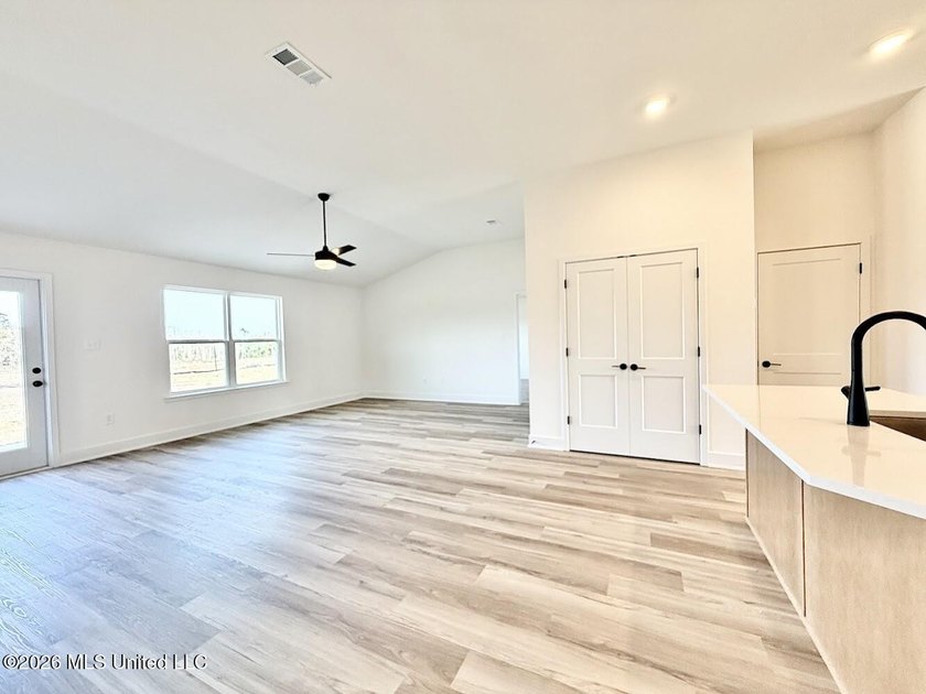 This beautifully designed 4 bedroom, 2 bath home blends modern - photo 13