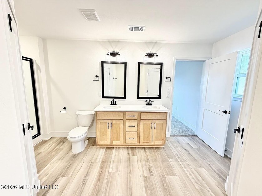 This beautifully designed 4 bedroom, 2 bath home blends modern - photo 19