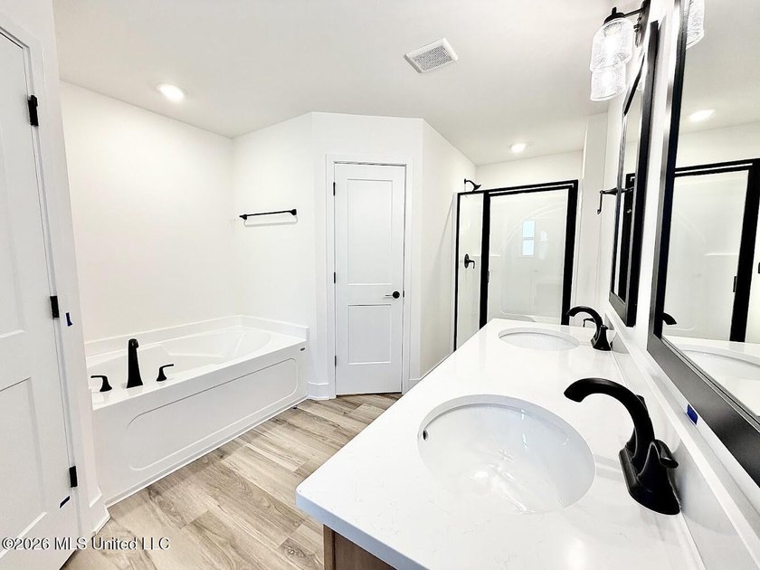 This beautifully designed 4 bedroom, 2 bath home blends modern - photo 22
