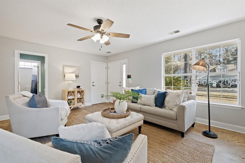 Freshly updated, this 4BR/2BA home located in The Farm offers a - photo 5