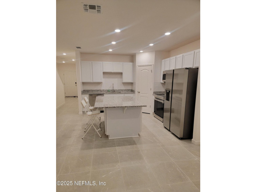 This 3-bedroom, 2 1/2 bathroom townhome is practically brand new - photo 5