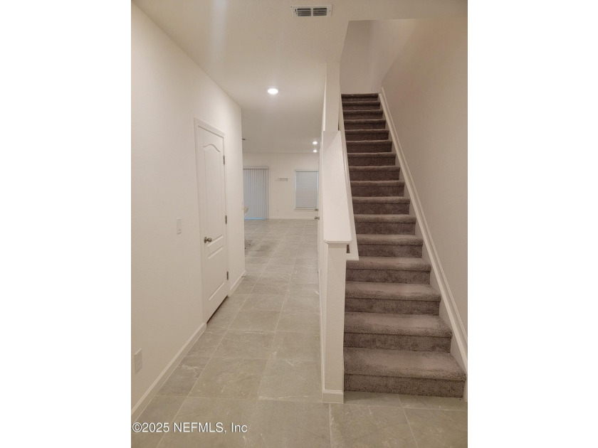 This 3-bedroom, 2 1/2 bathroom townhome is practically brand new - photo 8