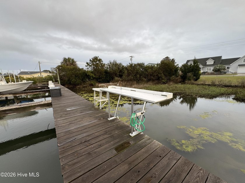 20' boat slip with boat lift located at the Harkers Island - photo 12