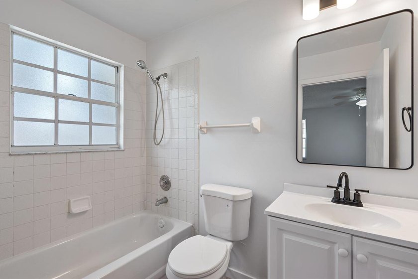 FRESHLY REMODELED Palm Bay home featuring a brand-new roof - photo 15