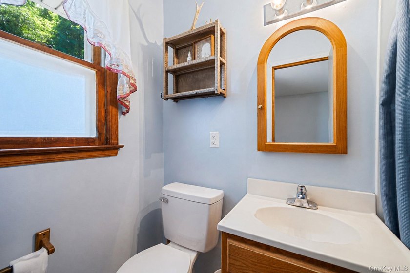 Welcome to 376 Moriches Road in St. James, where small-town - photo 18