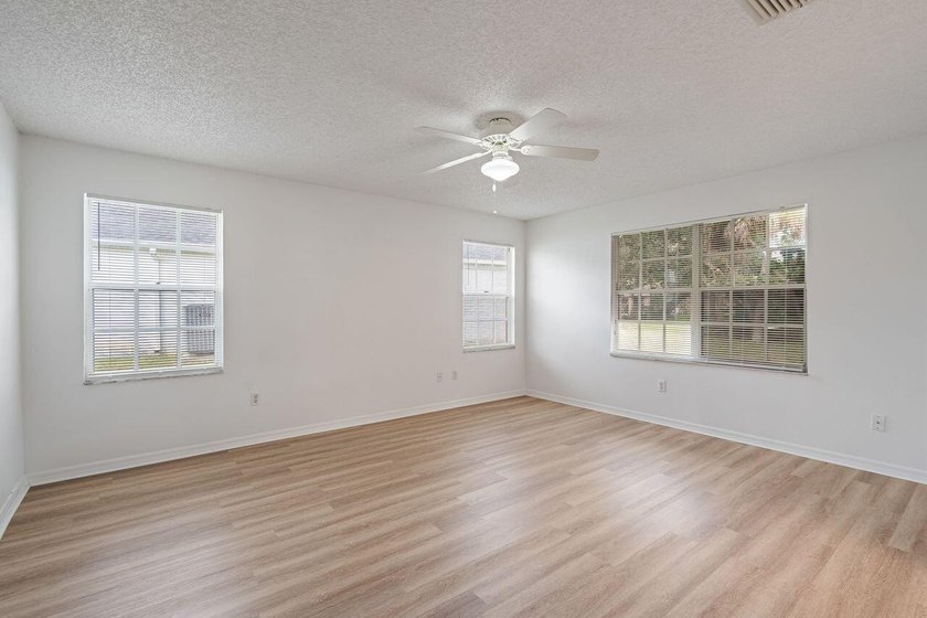 FRESHLY REMODELED Palm Bay home featuring a brand-new roof - photo 18