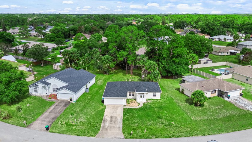 FRESHLY REMODELED Palm Bay home featuring a brand-new roof - photo 21