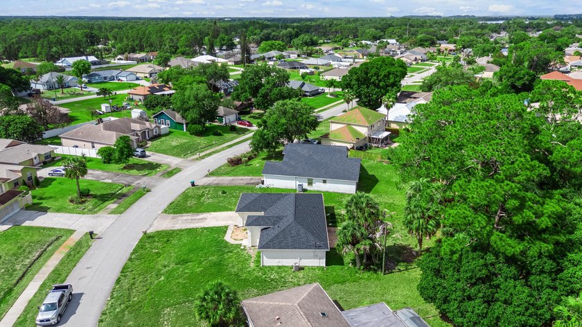 FRESHLY REMODELED Palm Bay home featuring a brand-new roof - photo 26
