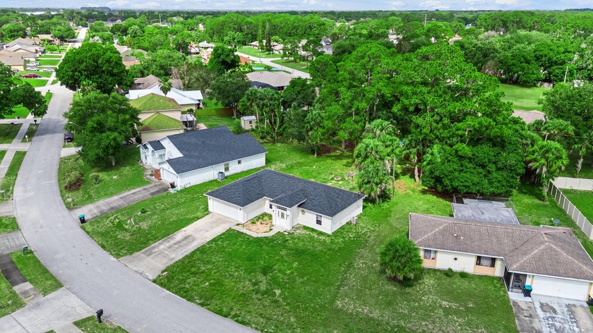 FRESHLY REMODELED Palm Bay home featuring a brand-new roof - photo 28