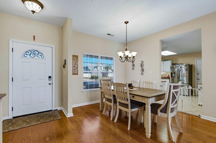 Welcome to 306 Pilot House Drive A Charming Home nestled in the - photo 3