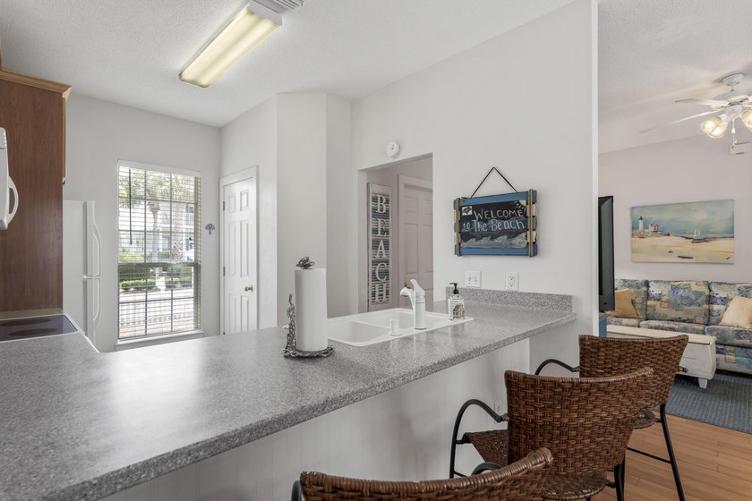 Location! Location! Welcome to 84 Tradewinds Drive, a charming - photo 6