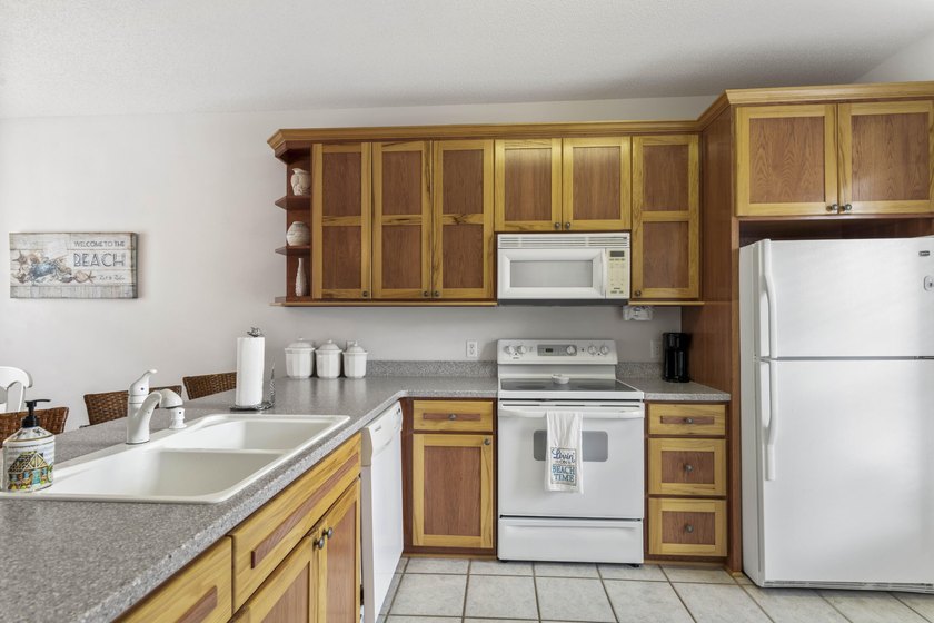 Location! Location! Welcome to 84 Tradewinds Drive, a charming - photo 7