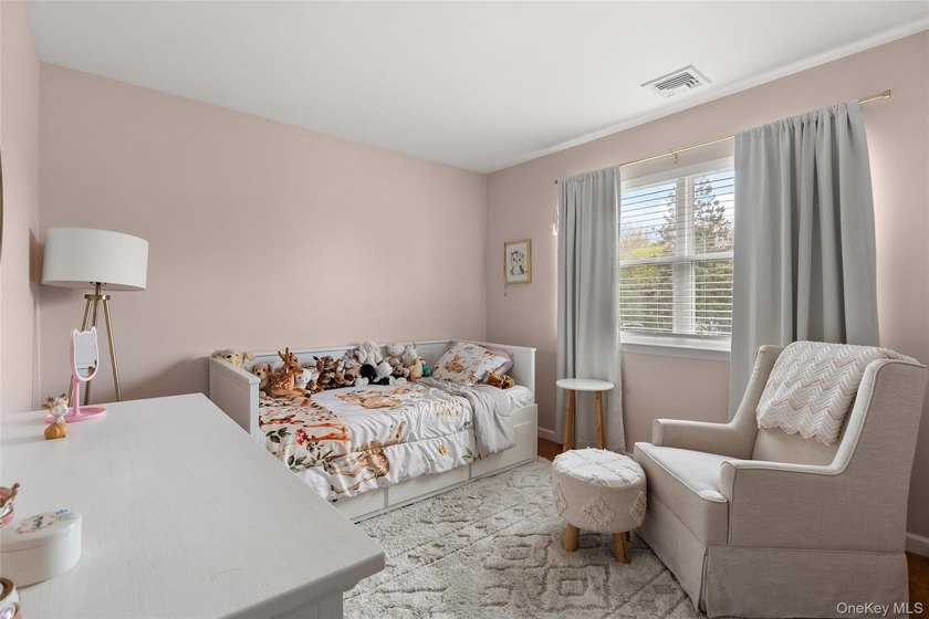This beautifully renovated Colonial in East Islip sits on an - photo 16