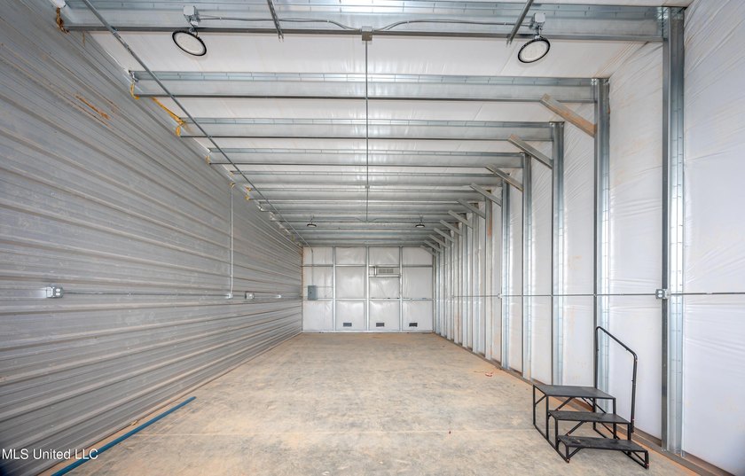 Here is your chance to OWN not Rent 1000sq ft of storage for you - photo 24