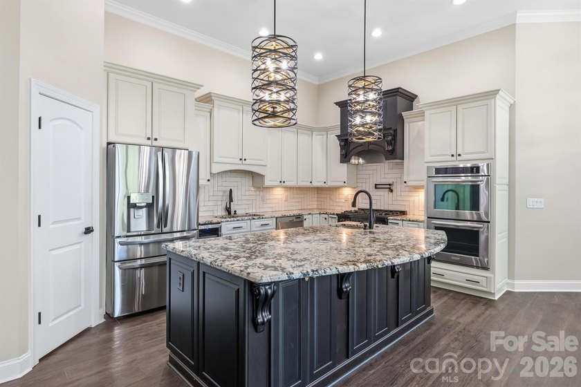 This stunning Waterfront home in the sought-after gated - photo 8