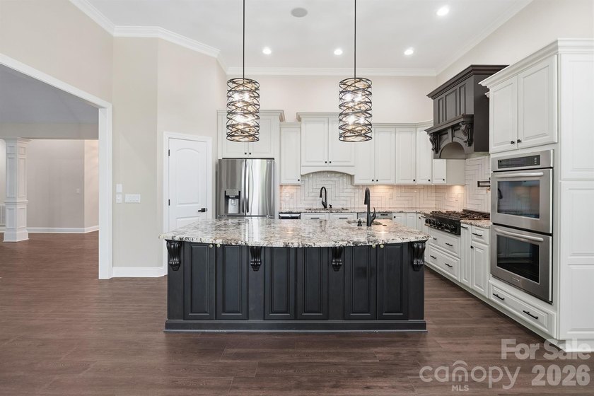 This stunning Waterfront home in the sought-after gated - photo 9
