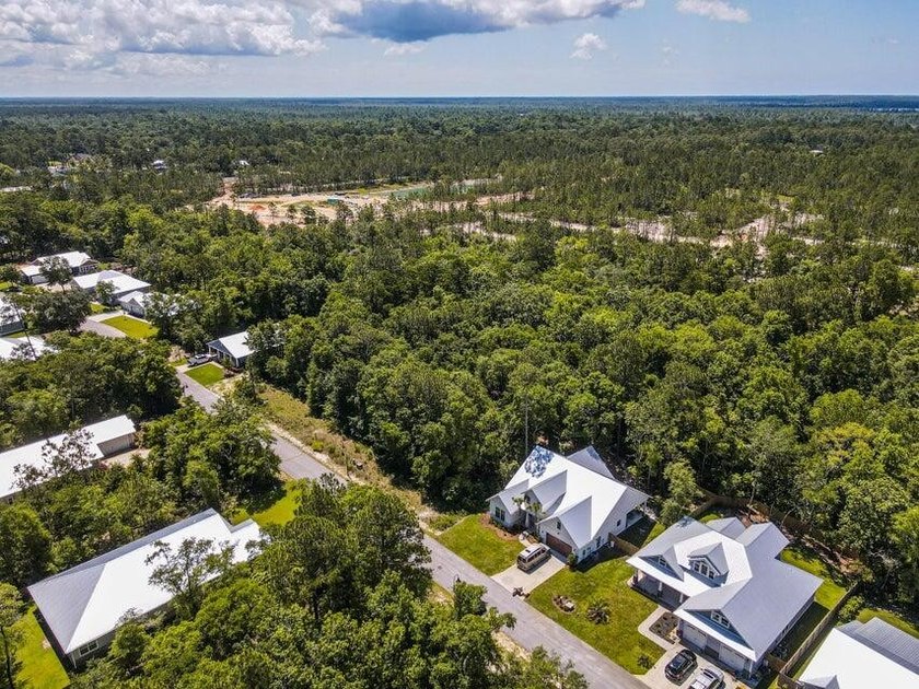 Located in the gated community of Bear Creek, this - photo 3