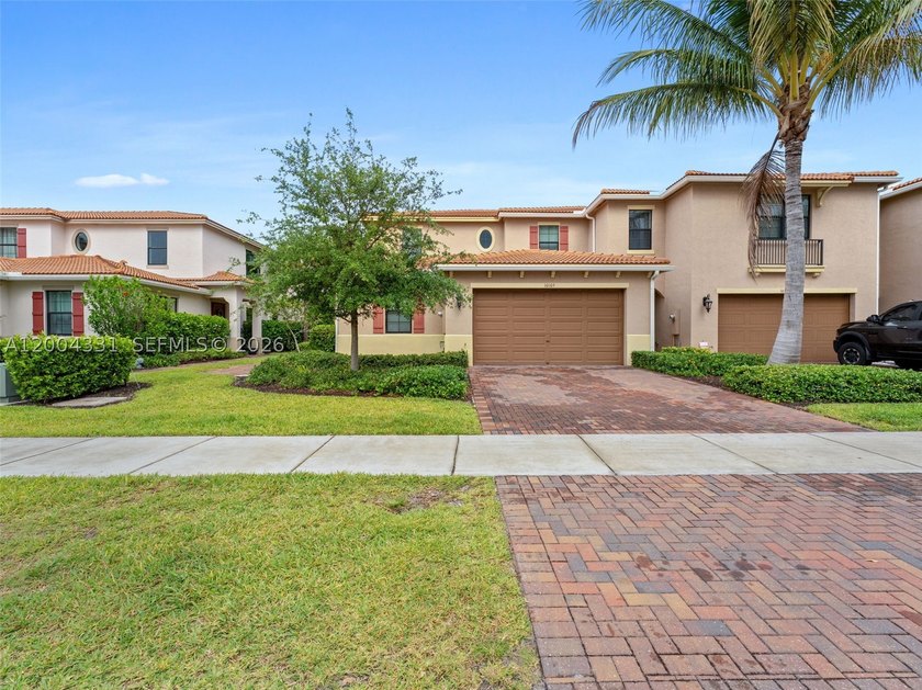 Welcome to gated living in the heart of Boca Raton. This - photo 3