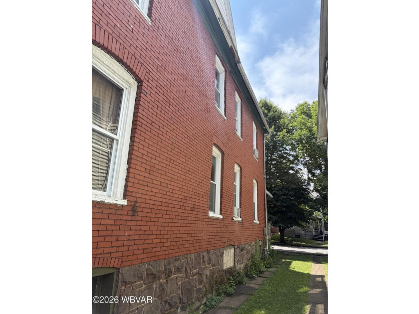 Solid Brick Half Double 2 Story Home featuring spacious living - photo 2